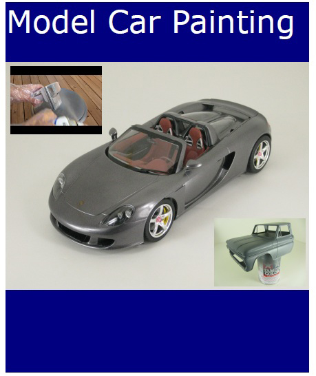 Holding A Model Car For Painting 